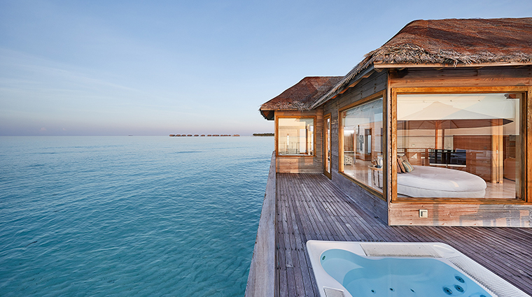 conrad maldives rangali island sunset water villa pool deck day